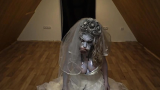 Platinum-Blonde stunner is fellating a enormous, faux jizz-shotgun while clad up in a Halloween zombi- bride costume