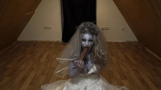 Platinum-Blonde stunner is fellating a enormous, faux jizz-shotgun while clad up in a Halloween zombi- bride costume