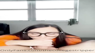 Enthralling school lady is dressed in glasses while deep-throating her roomie's shaft in a POINT OF VIEW fashion