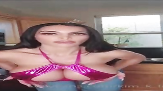 Big-Chested foolish is posing and taunting on webcam, in the middle of a glorious day