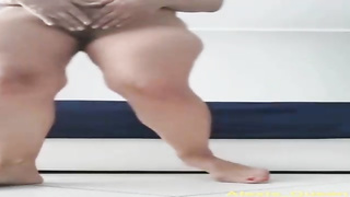 Jaw-Dropping black-haired with a cute, chubby ass is kneading her vag in front of the camera