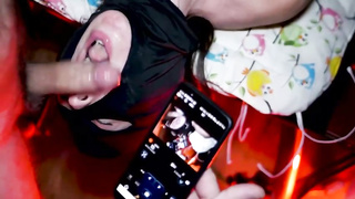 Hooded gal is getting a rock rock-hard boner down her gullet, in front of the camera