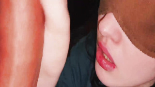 Blinded, Russian honey is softly gargling a rigid man meat in front of the camera and liking it