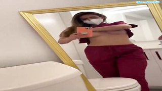 Extraordinaire dame, Katana Kombat is massaging her ideally bald puss in front of the camera