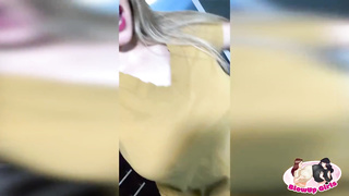 Buxom stunner is posing and taunting in front of the camera, while alone at home