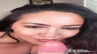 Killer brown-haired is fellating a meaty, faux pink cigar and pawing it with her ginormous knockers