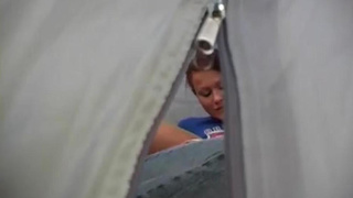 Black-Haired nubile gal screwing in a tent