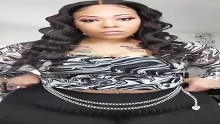 Ebony gal is posing an taunting in front of the camera, in the middle of the day