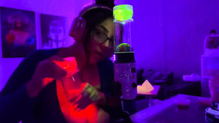 Big-Chested black-haired is posing and taunting in front of the camera in the middle of the night