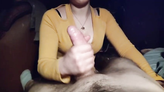 Beefstick lovin’ stunner is providing a hand job to a buddy, in front of the camera