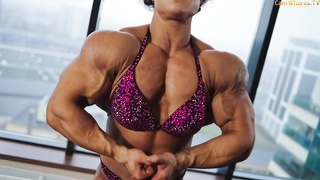 Korableva is a sport model who loves to showcase her muscles in front of the camera