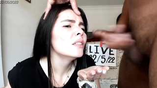 Nerdy brown-haired with glasses is impatiently deep-throating a ginormous, black man-meat, in front of the camera