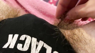 Enthralling cougar is delicately finger-banging her unshaved fuckbox in front of the camera, just for joy