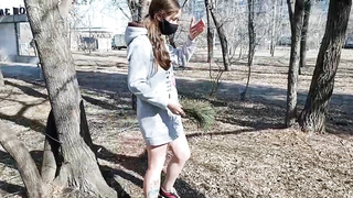 Mischievous stunner is dressed in a mask while ambling around the local park bottomless, during the day