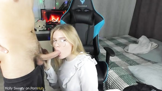 Russian light-haired with glasses is deepthroating a rock rock hard jizz-shotgun while getting down on all fours on the floor