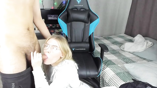 Russian light-haired with glasses is deepthroating a rock rock hard jizz-shotgun while getting down on all fours on the floor
