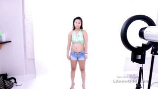 Attractive Chinese black-haired is inhaling a black fuckpole and hoping to get rammed with it