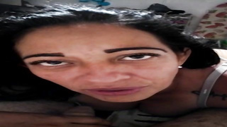 Mature dame with curly hair is deepthroating her paramour's pecker and getting screwed from the back