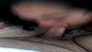 Mature dame with curly hair is deepthroating her paramour's pecker and getting screwed from the back