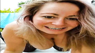 Nikki Brooks is a large breasted, towheaded lady who knows how to make herself jizz