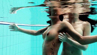 Frolic nymphs got nude in the swimming pool and had some joy while no one was witnessing