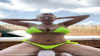 Messy minded, towheaded cougar with XXL tits, Wicky is frolicking with herself in the backyard