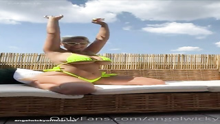 Messy minded, towheaded cougar with XXL tits, Wicky is frolicking with herself in the backyard