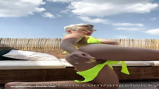 Messy minded, towheaded cougar with XXL tits, Wicky is frolicking with herself in the backyard