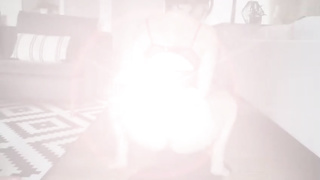 Kinky black-haired in softcore, crimson undergarments is using a good-sized fake penis while jerking on webcam