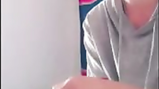 Dark-Haired with glasses is being a highly mischievous dame in front of a covert camera