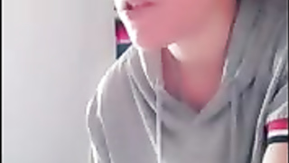 Dark-Haired with glasses is being a highly mischievous dame in front of a covert camera