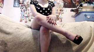 Fetching chick in boots with high high-heeled slippers is demonstrating her ultra-cute gams on live webcam