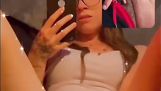 Crimson haired stunner is fellating a glass fake penis before jacking on webcam, late at night