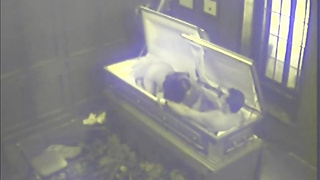 Insane black-haired was caught deep throating a rock stiff fuck-stick and having fuckfest in the coffin
