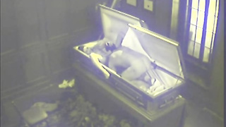 Insane black-haired was caught deep throating a rock stiff fuck-stick and having fuckfest in the coffin