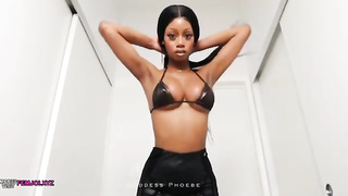 Supreme looking, Ebony honey with enormous, rock-hard bumpers is posing and taunting in front of the camera