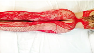 Latin gal with platinum-blonde hair is dressed in crimson, fishnet bodystocking while getting plowed from behind