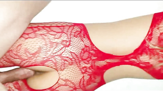 Latin gal with platinum-blonde hair is dressed in crimson, fishnet bodystocking while getting plowed from behind