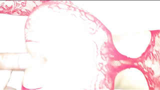 Latin gal with platinum-blonde hair is dressed in crimson, fishnet bodystocking while getting plowed from behind