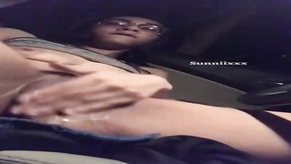 Wild dame with glasses is caressing and frigging her moist cooter in the back of a van