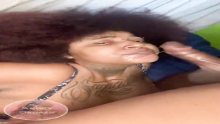 Whorey African honey with tats is anxiously throating a rock rock hard spunk-pump and touching it with boobs