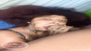 Whorey African honey with tats is anxiously throating a rock rock hard spunk-pump and touching it with boobs