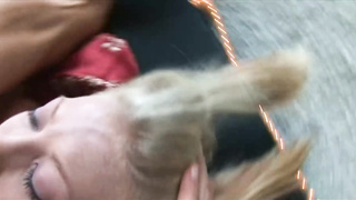 Ponytailed platinum-blonde nubile is blowing a fat, rigid meatpipe as deep as she can guzzle it