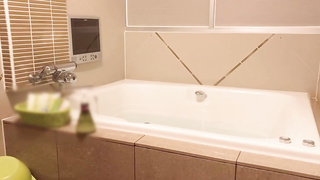 Smallish Korean dark haired is gargling her married paramour's cock in the bathtub bathtub, late at night