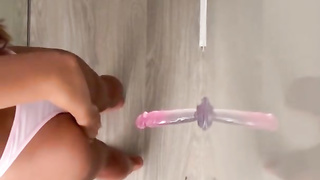 The female affixed a protection weenie to the wall and got an ejaculation from it