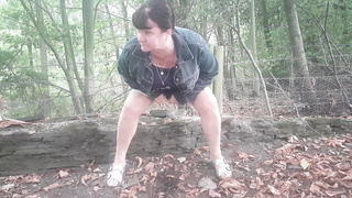 Slut urinates on path