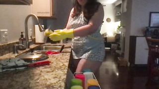 Phat booty housewife is taunting while doing her palace work, because it makes her sense fine