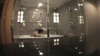 Puny breasted, Chinese dame is opening up her gams broad open while getting torn up in a motel bedroom