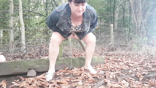 Babe urinates outside