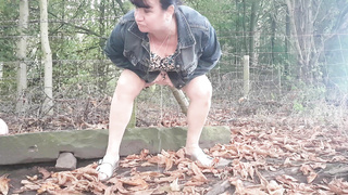 Babe urinates outside